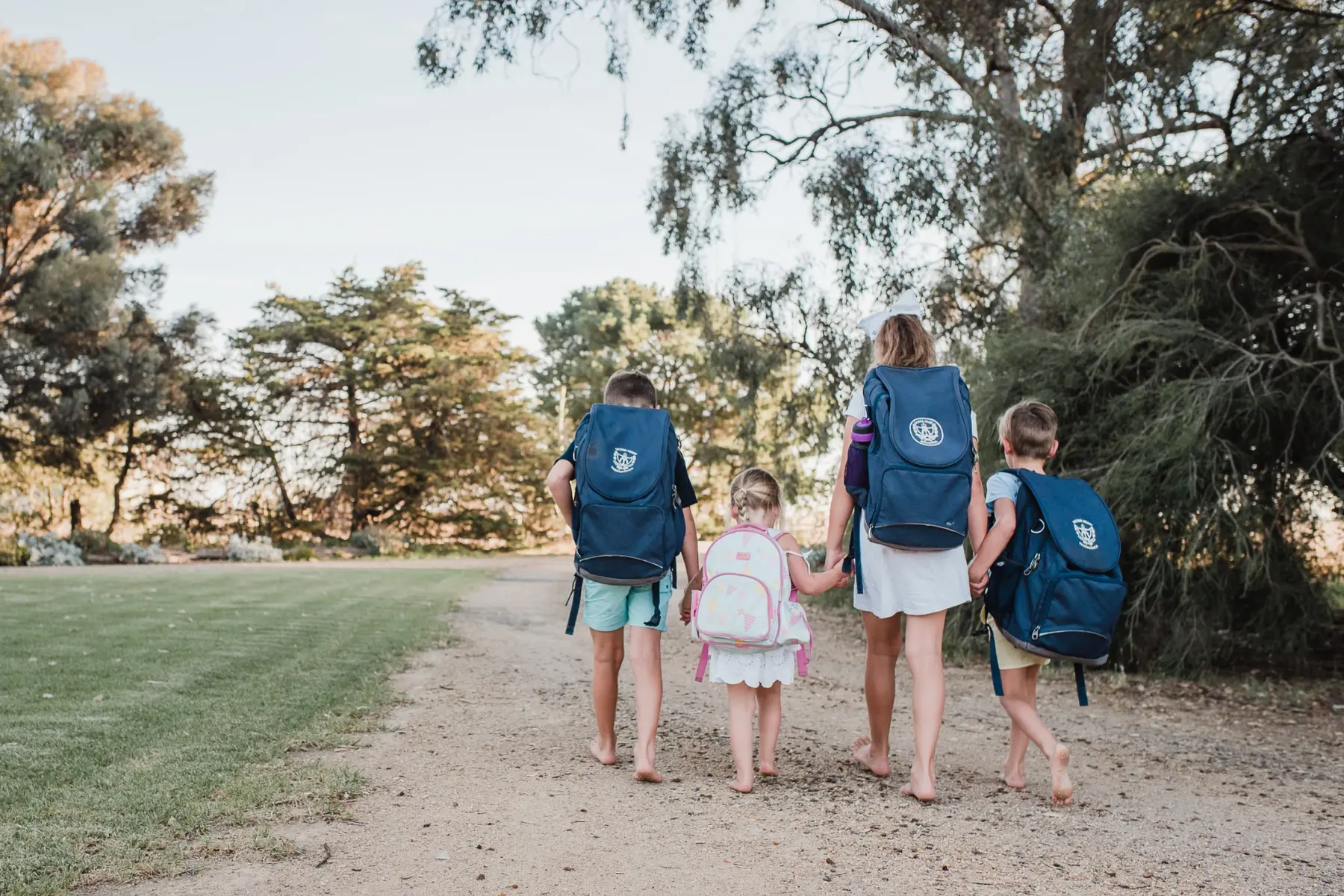 Children walking together with school bags